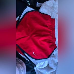 red nike shorts